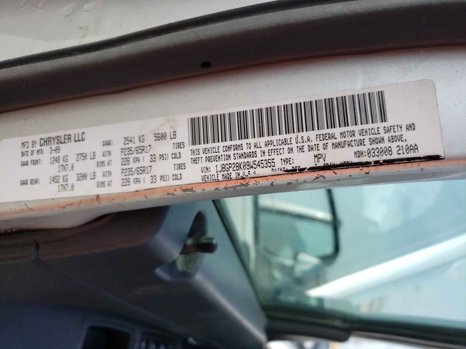 Photo 10 from auction – 2009 JEEP LIBERTY SP with VIN 1J8GP28K09W545355