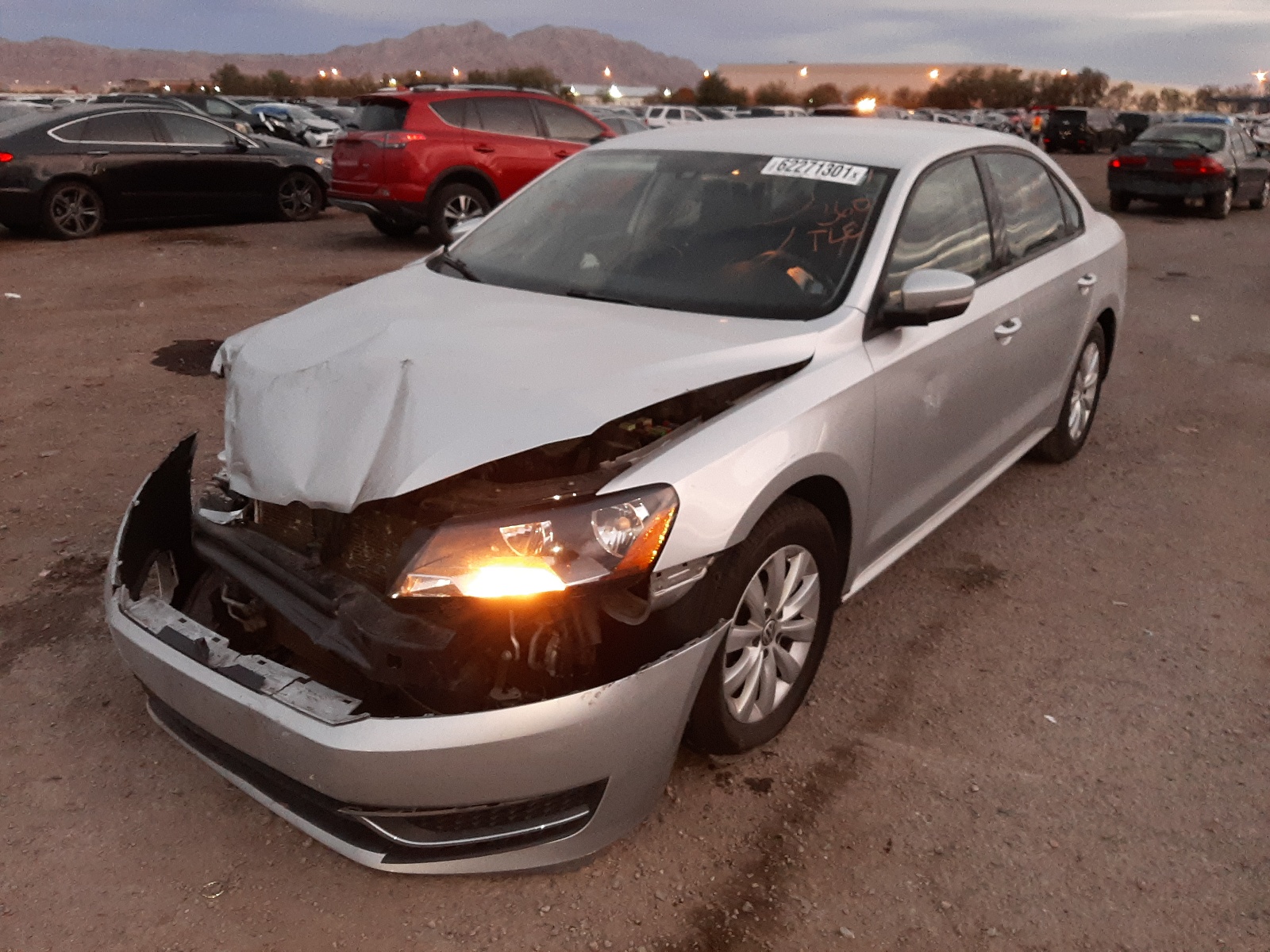 Photo 2 from auction – 2015 VOLKSWAGEN PASSAT S with VIN 1VWAT7A31FC043084