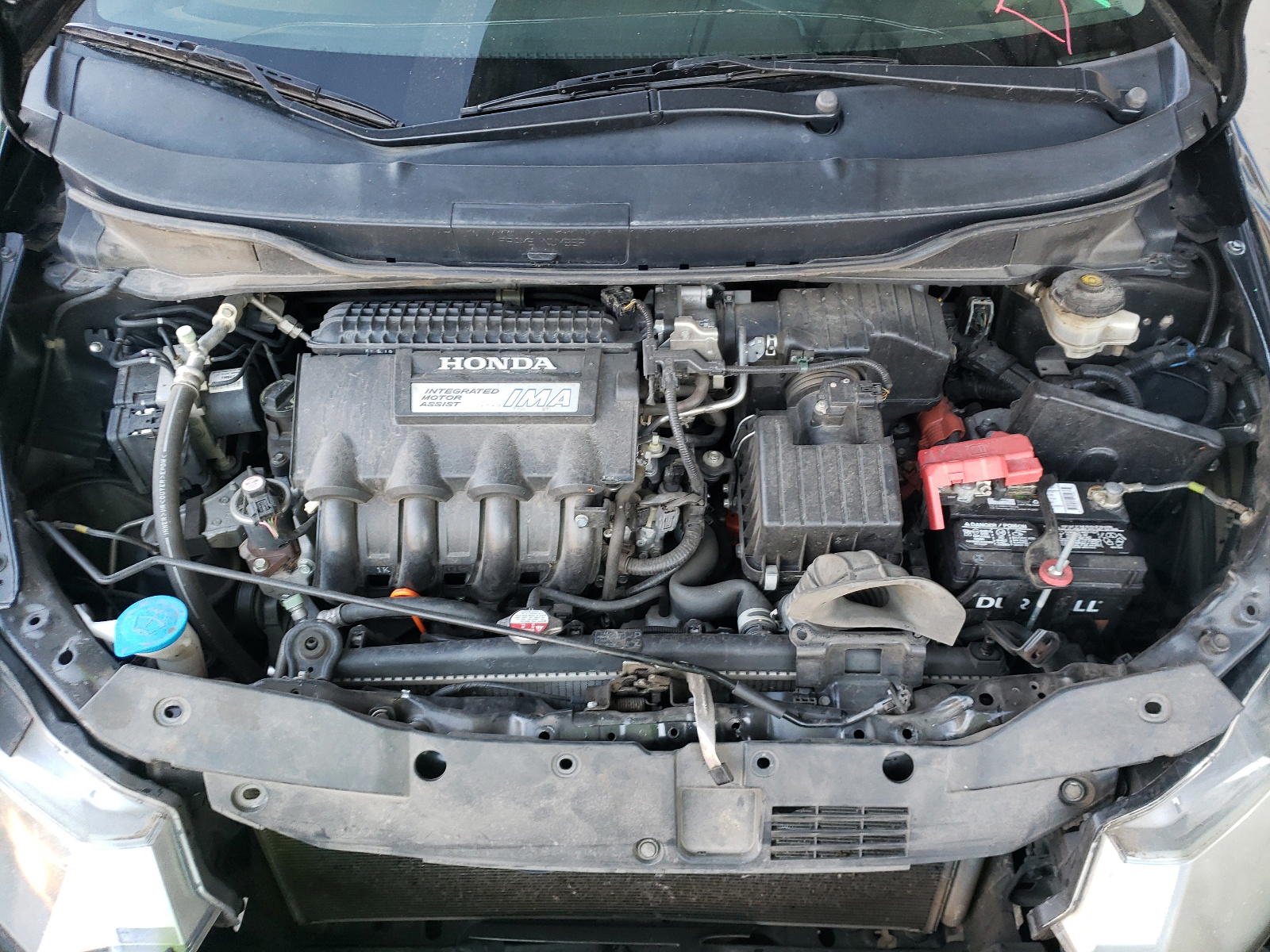 Photo 7 from auction – 2011 HONDA INSIGHT EX with VIN JHMZE2H72BS009763
