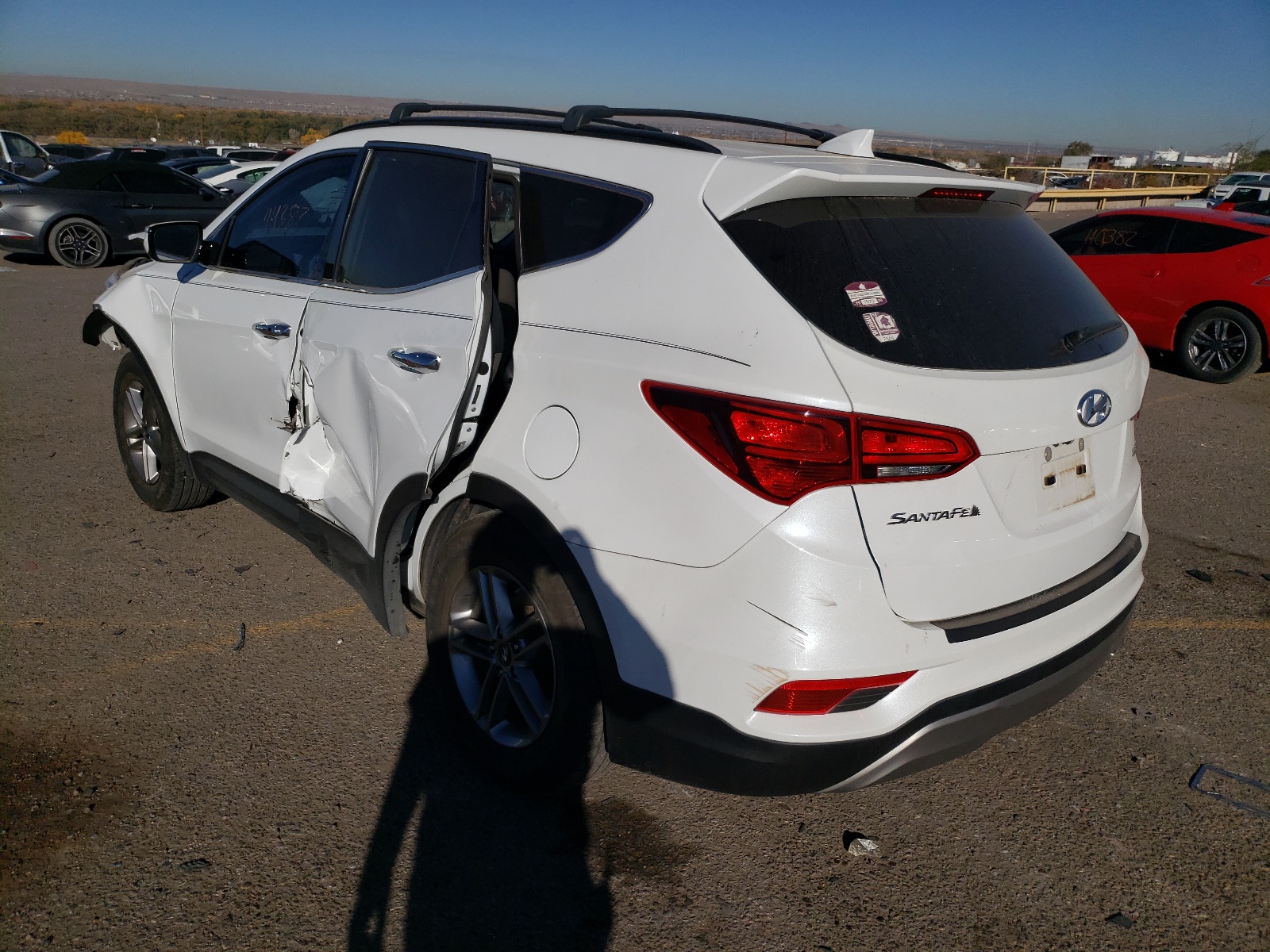 Photo 3 from auction – 2017 HYUNDAI SANTA FE S with VIN 5NMZU3LB1HH042053