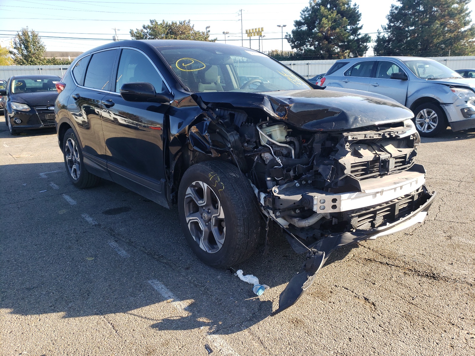 HONDA CR-V EX 2018 with VIN 7FARW1H58JE007765 - Photo from auction