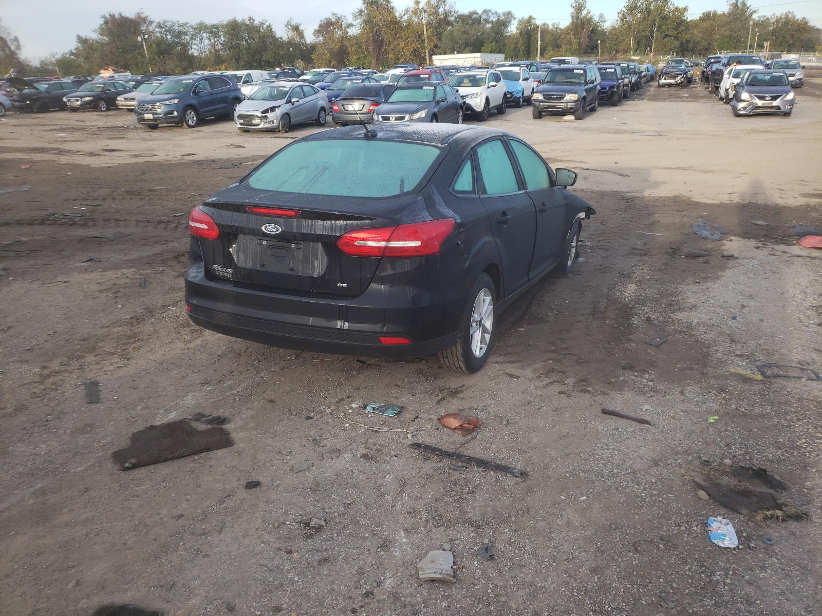 Photo 4 from auction – 2018 FORD FOCUS SE with VIN 1FADP3F29JL203076