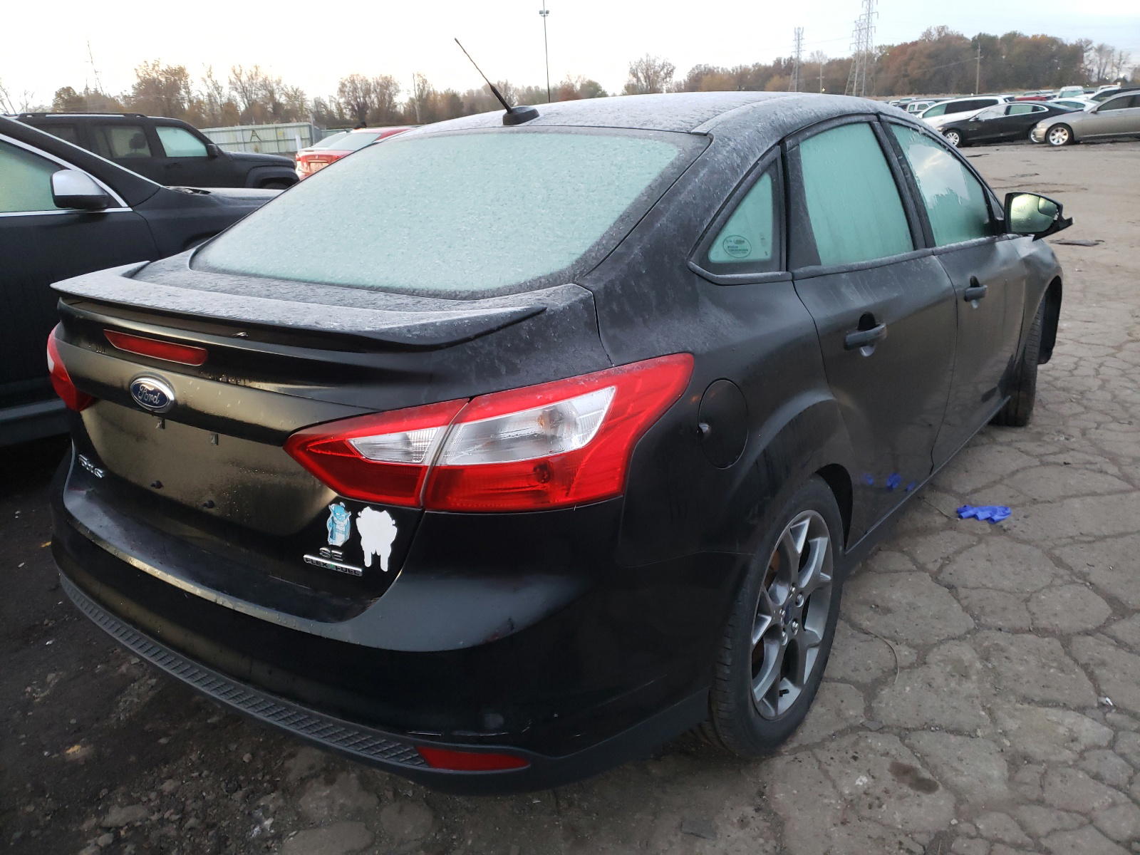 Photo 4 from auction – 2014 FORD FOCUS SE with VIN 1FADP3F28EL450479