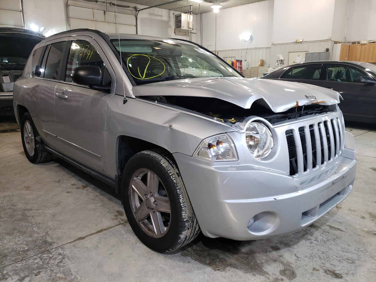 JEEP COMPASS SP 2010 with VIN 1J4NT4FB7AD506460 - Photo from auction