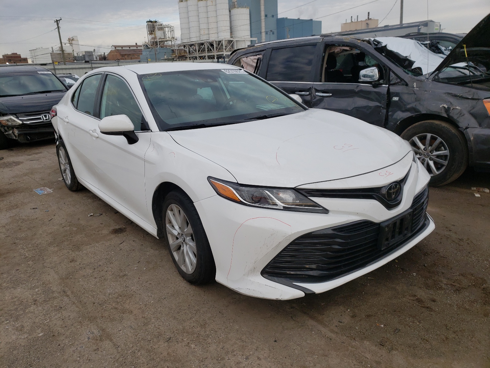 TOYOTA CAMRY L 2019 with VIN 4T1B11HK2KU257587 - Photo from auction