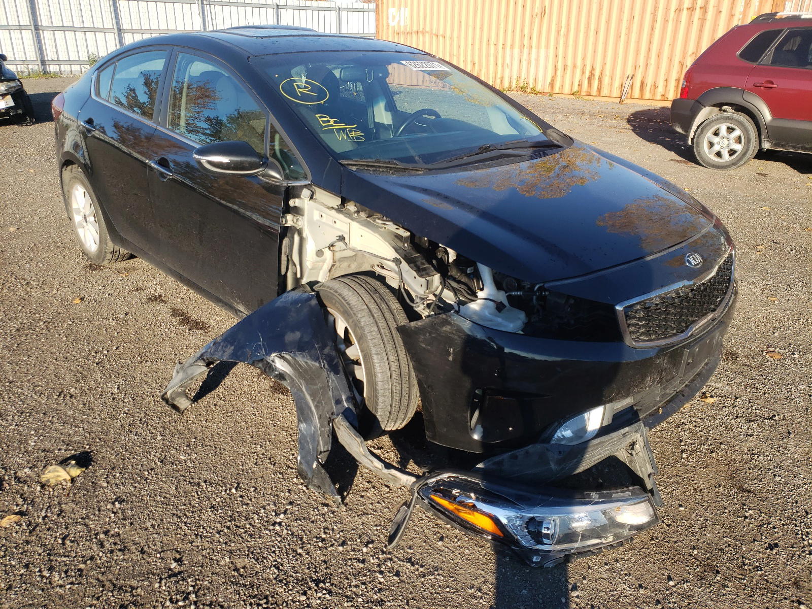 KIA FORTE EX 2017 with VIN 3KPFL4A84HE069662 - Photo from auction
