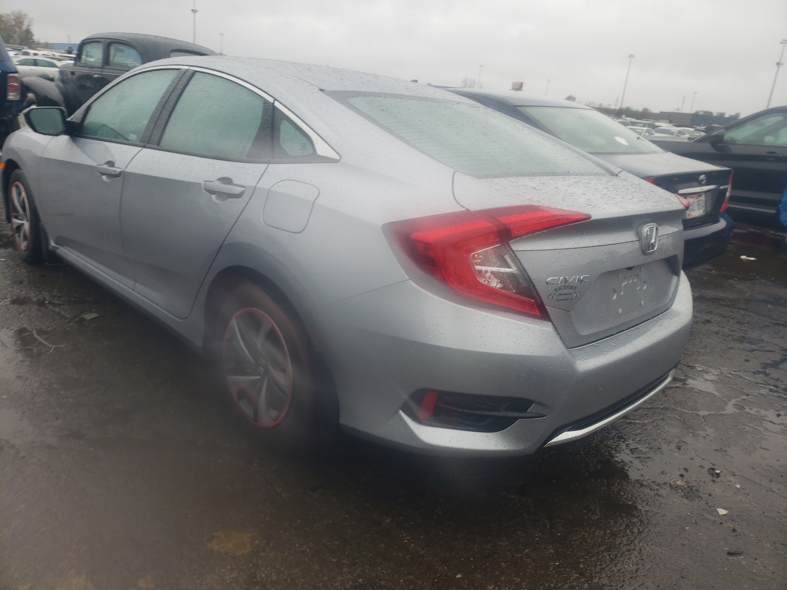 Photo 3 from auction – 2019 HONDA CIVIC LX with VIN 19XFC2F64KE049639