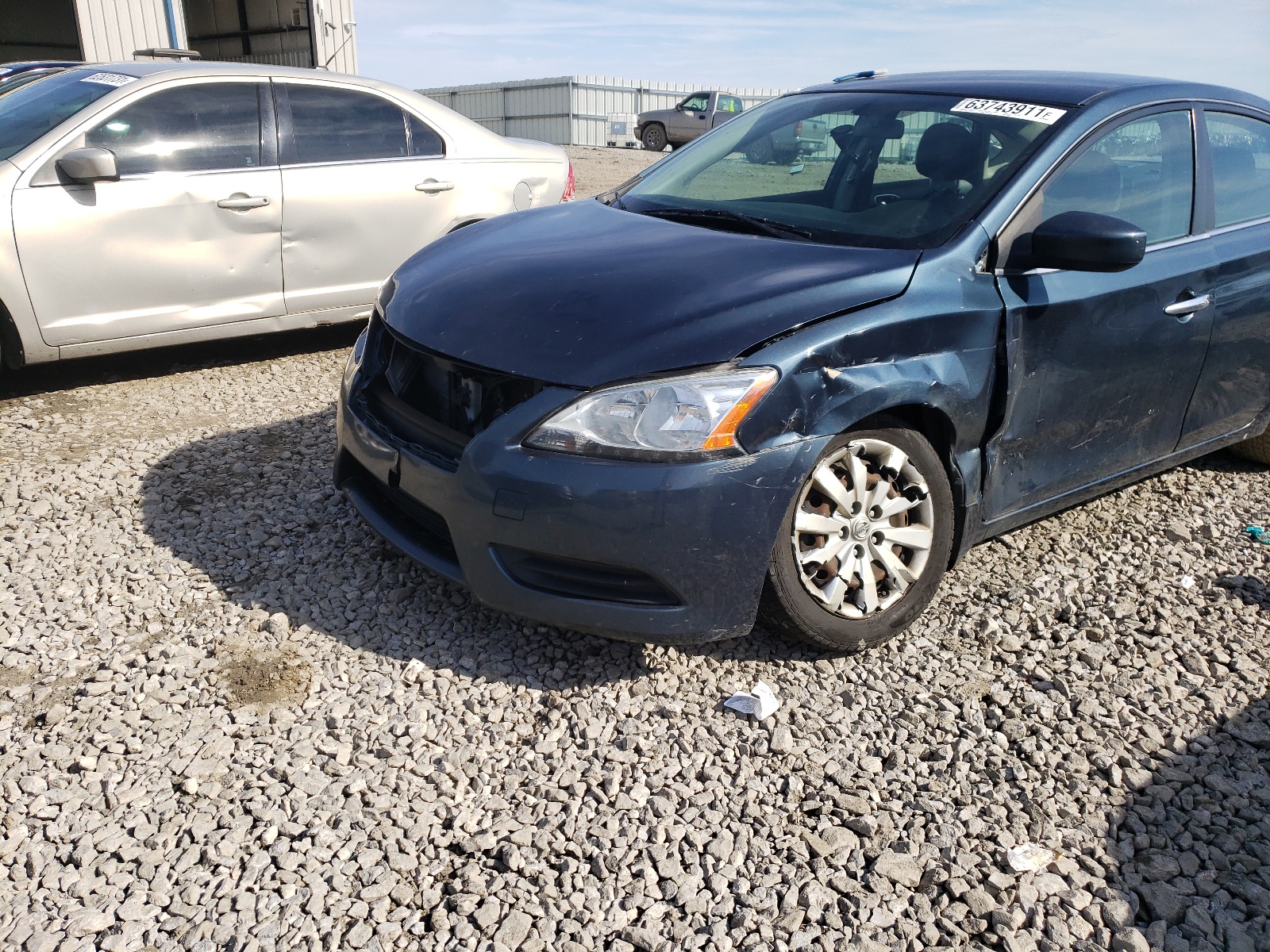 Photo 9 from auction – 2015 NISSAN SENTRA S with VIN 3N1AB7AP2FL684311