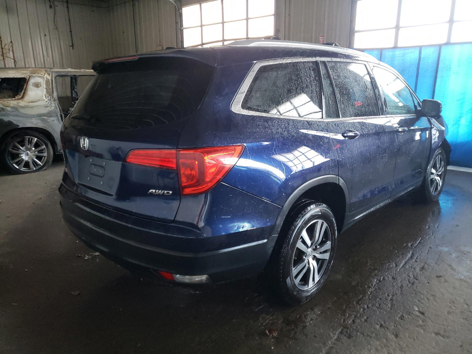 Photo 4 from auction – 2016 HONDA PILOT with VIN 5FNYF6H77GB102879