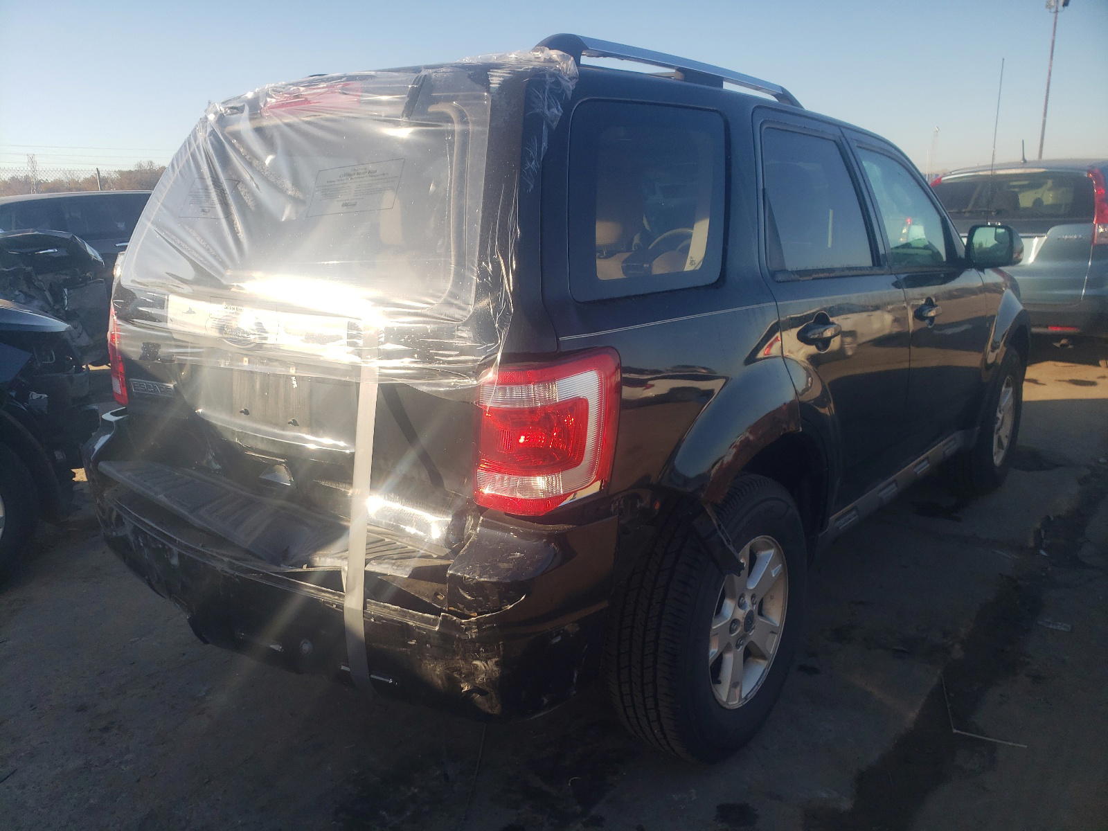 Photo 4 from auction – 2012 FORD ESCAPE LIM with VIN 1FMCU0E79CKB29057