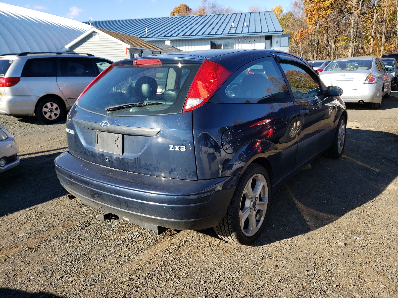Photo 4 from auction – 2003 FORD FOCUS ZX3 with VIN 3FAFP31303R123453