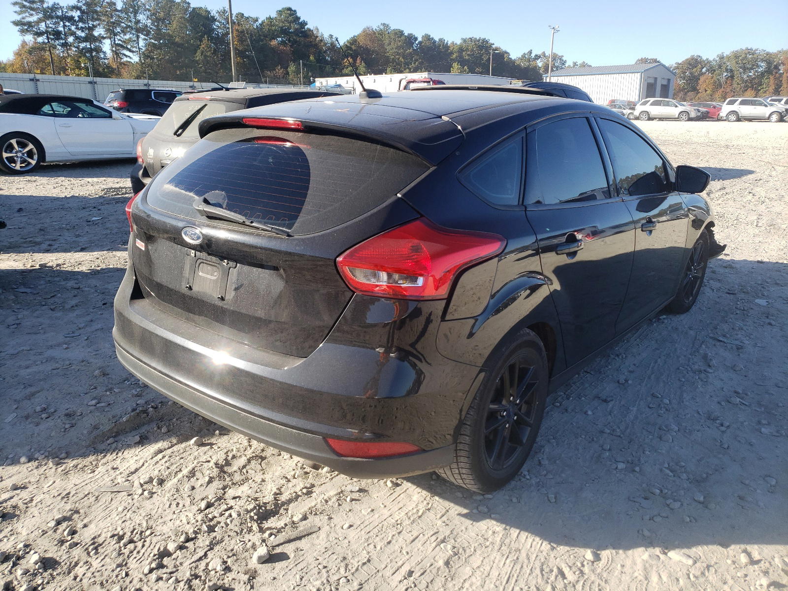 Photo 4 from auction – 2016 FORD FOCUS with VIN 1FADP3K21GL364746