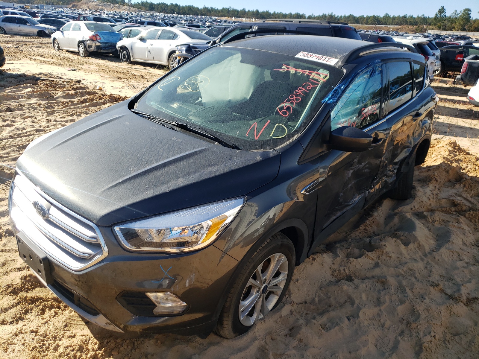 Photo 2 from auction – 2018 FORD ESCAPE SE with VIN 1FMCU0GD0JUD48526