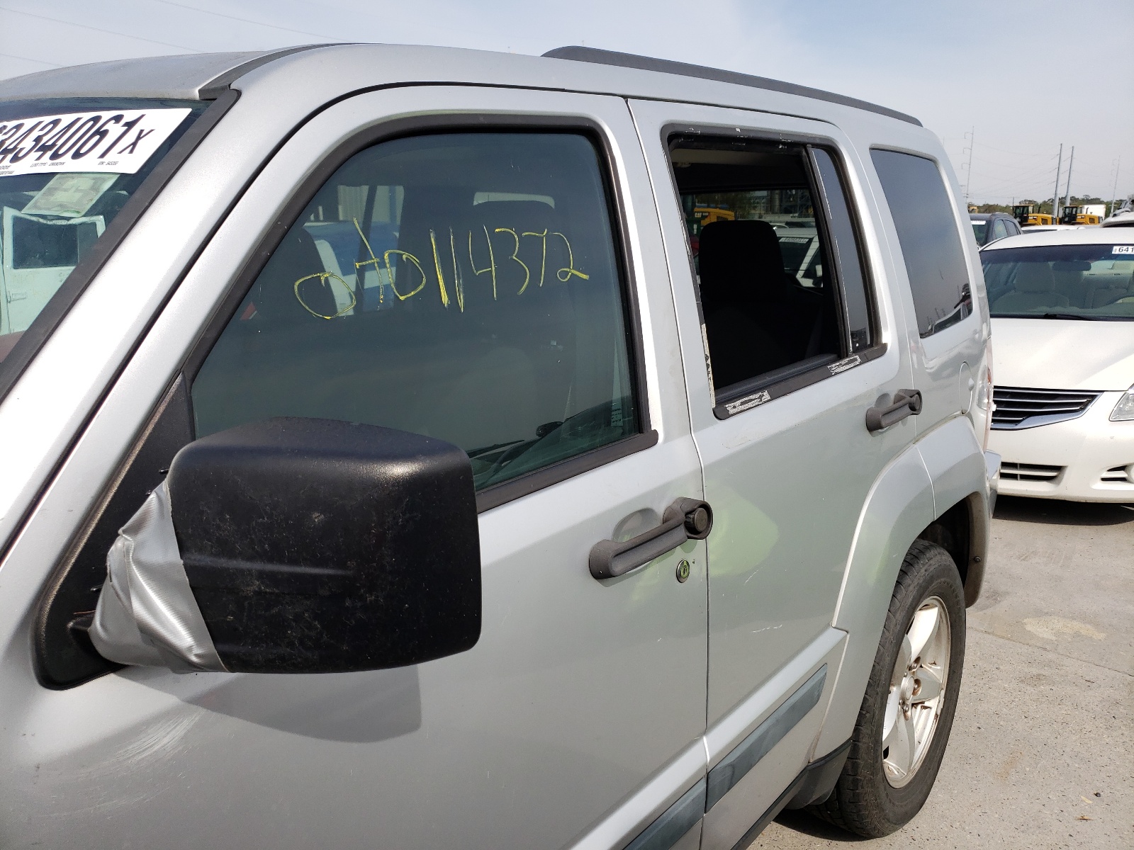 Photo 9 from auction – 2009 JEEP LIBERTY SP with VIN 1J8GP28K09W545355