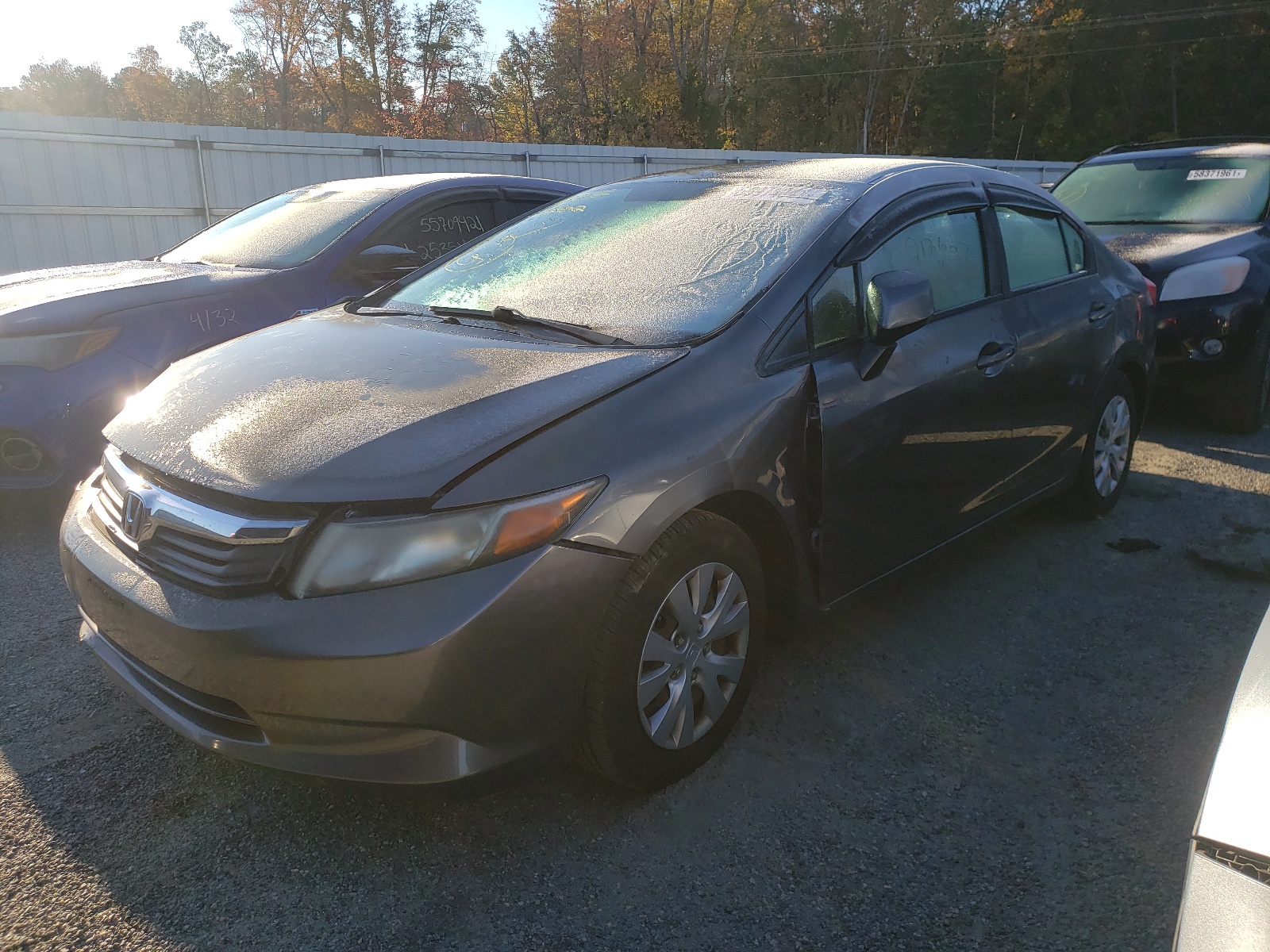 Photo 2 from auction – 2006 HONDA CIVIC LX with VIN 19XFB2F50CE007822