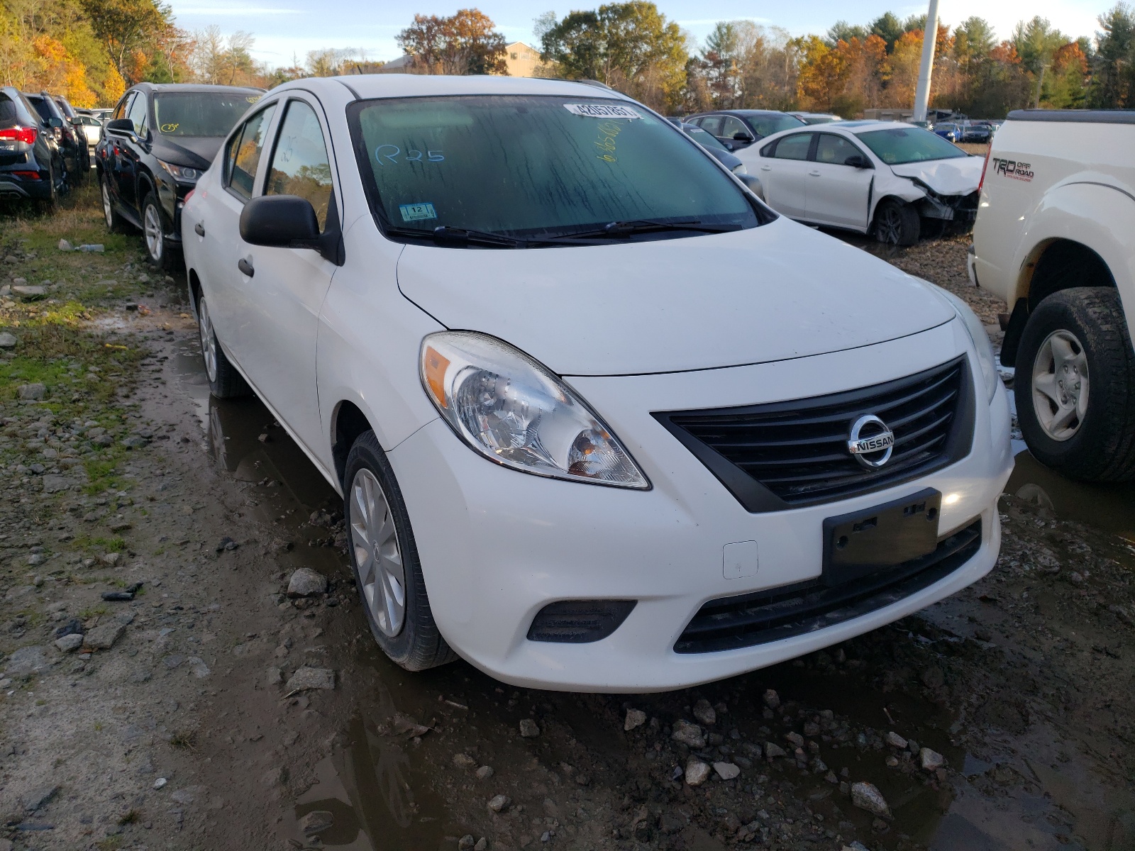 NISSAN VERSA S 2014 with VIN 3N1CN7AP7EL813061 - Photo from auction