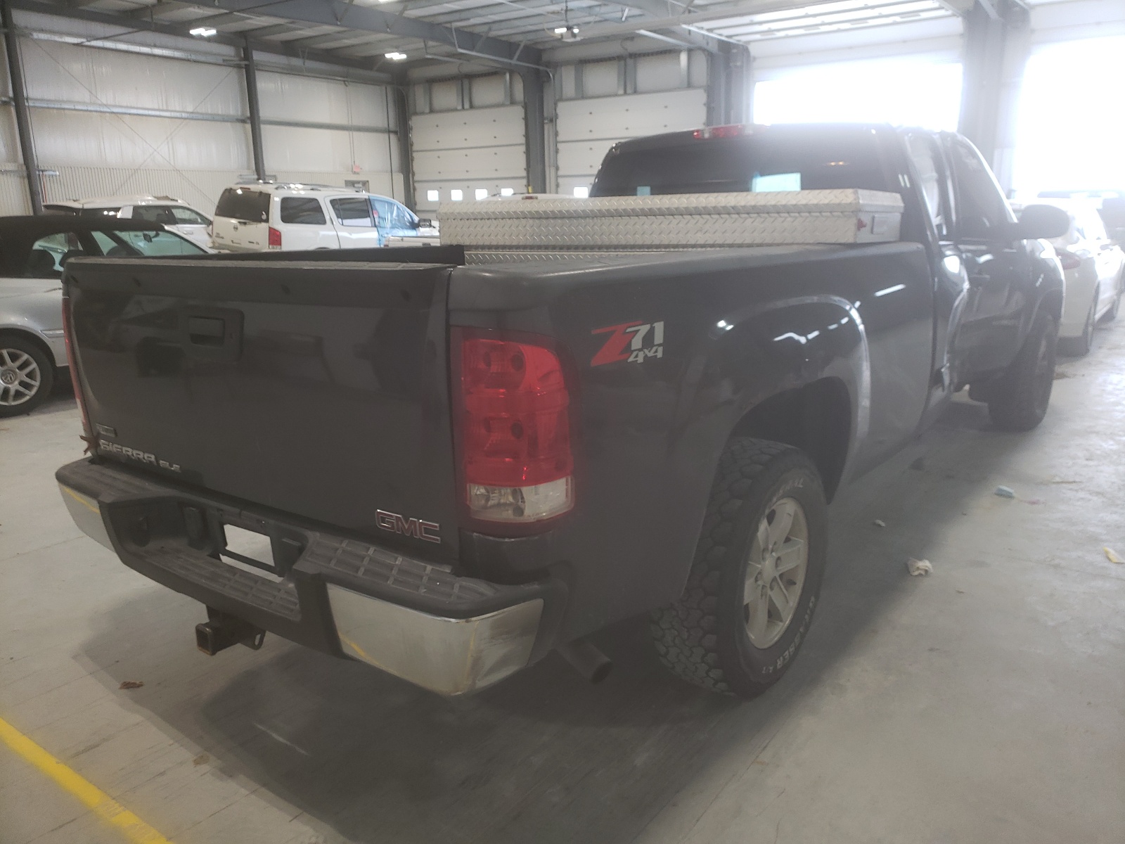 Photo 4 from auction – 2011 GMC SIERRA K15 with VIN 1GTR2VE06BZ240160