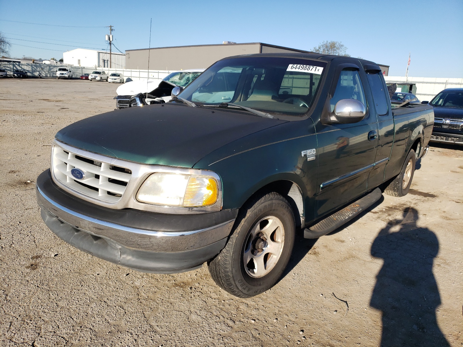 Photo 2 from auction – 1999 FORD F150 with VIN 1FTRX17W2XNA61835