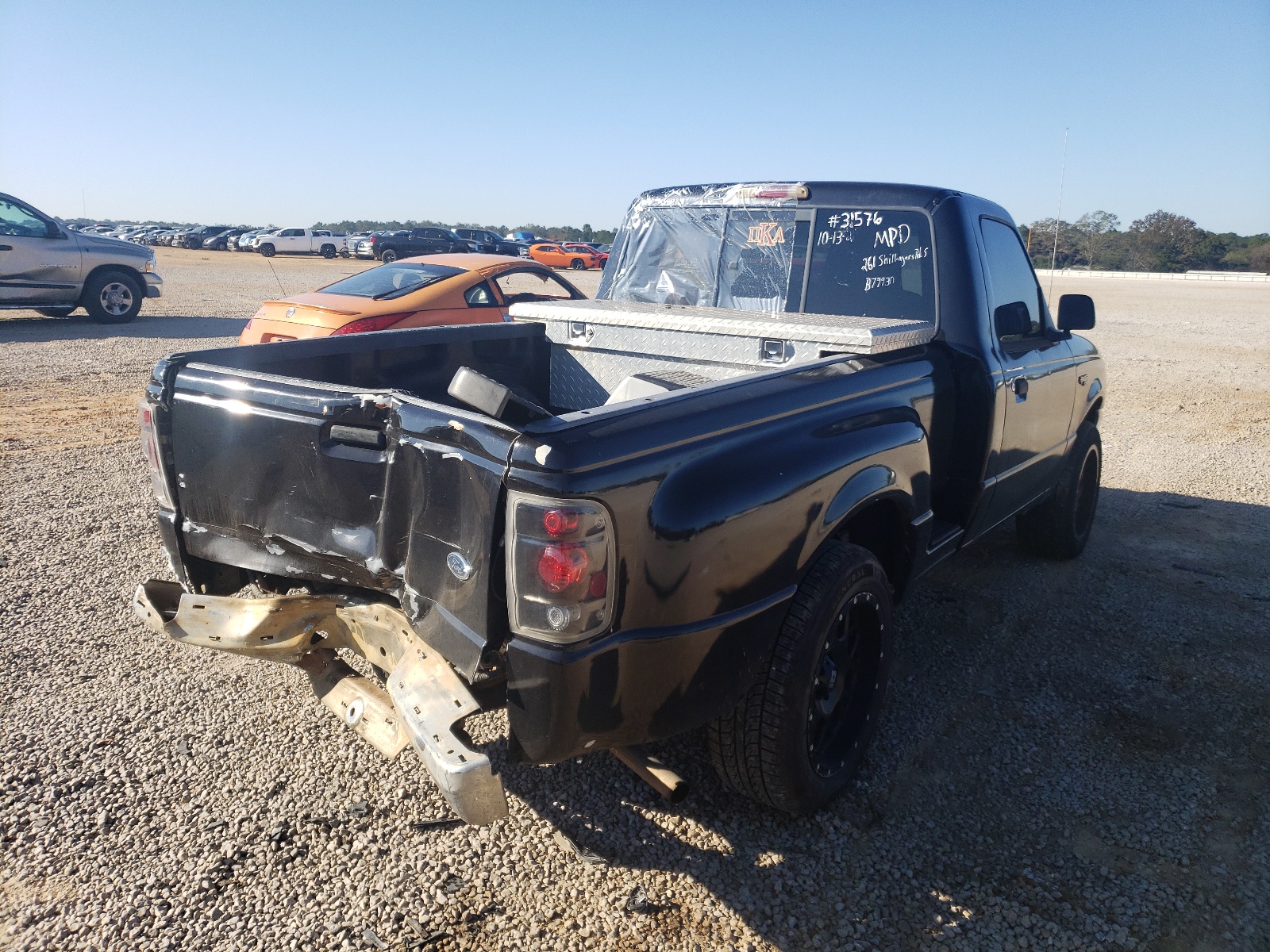 Photo 4 from auction – 1999 FORD RANGER with VIN 1FTYR10V0XPB79930