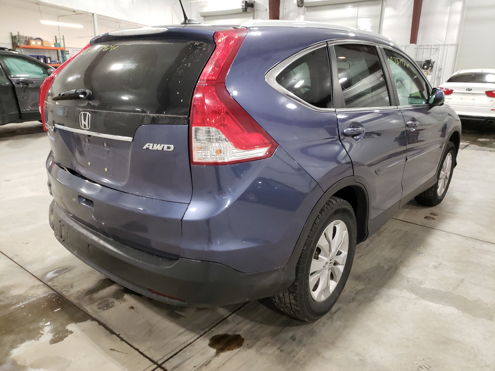 Photo 4 from auction – 2014 HONDA CR-V EXL with VIN 2HKRM4H76EH645251