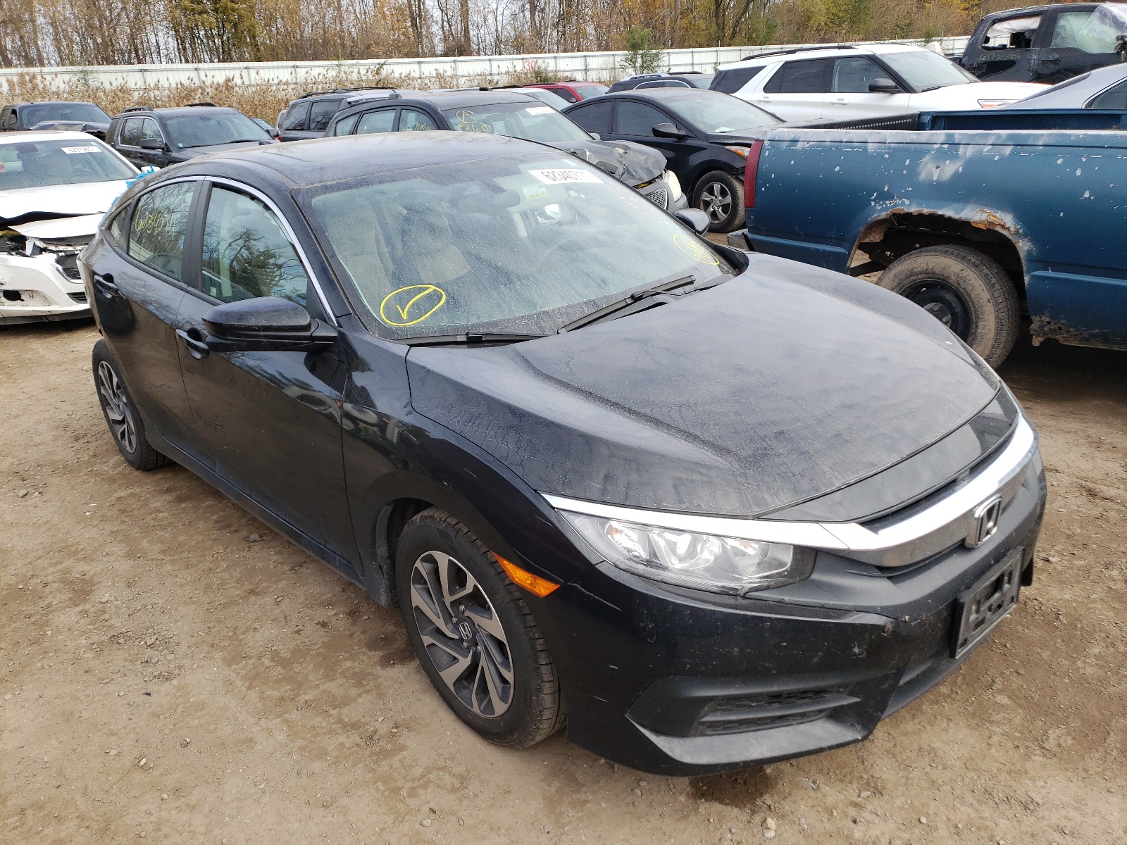 HONDA CIVIC EX 2018 with VIN 2HGFC2F70JH603501 - Photo from auction
