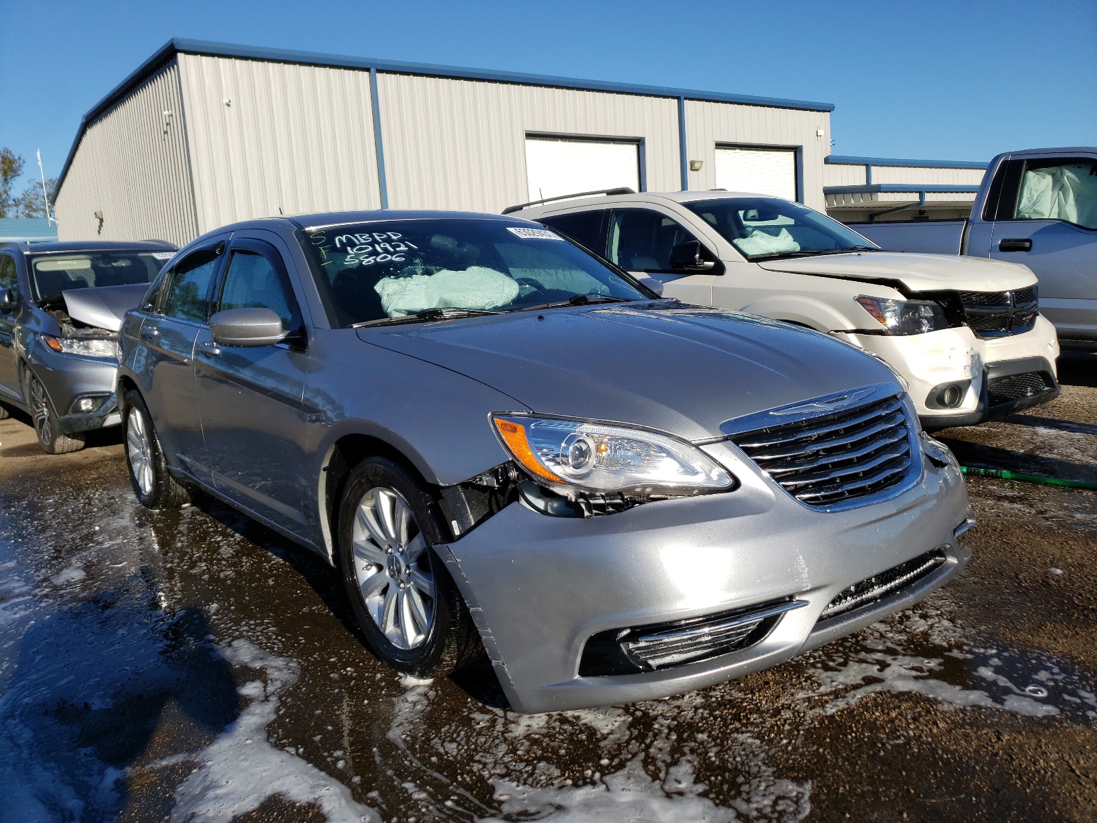 CHRYSLER 200 TOURIN 2014 with VIN 1C3CCBBG7EN105806 - Photo from auction
