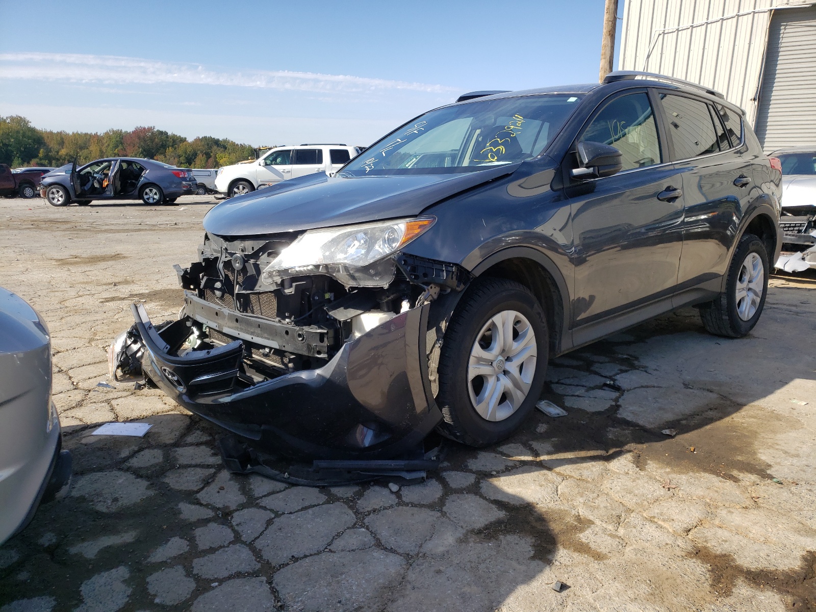 Photo 2 from auction – 2014 TOYOTA RAV4 LE with VIN JTMZFREV6ED031252
