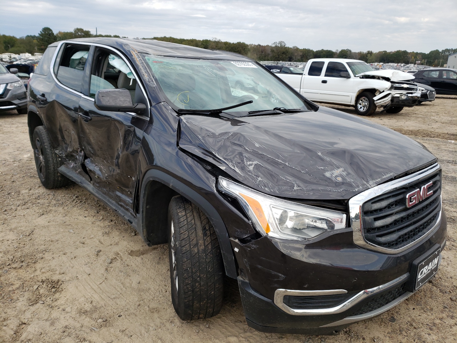 GMC ACADIA SLE 2019 with VIN 1GKKNKLAXKZ122099 - Photo from auction