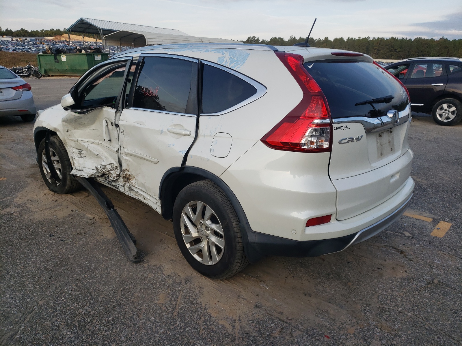 Photo 3 from auction – 2016 HONDA CR-V EXL with VIN 5J6RM4H70GL135258