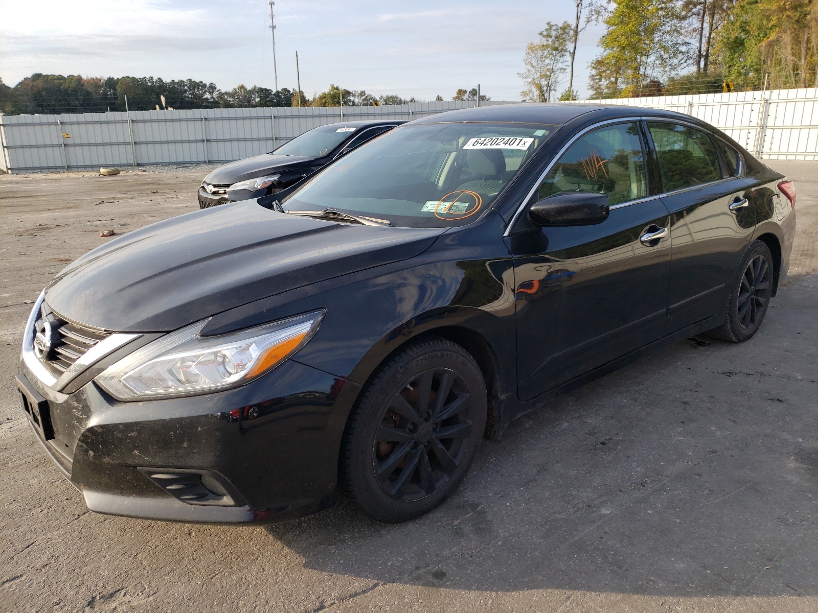 Photo 2 from auction – 2016 NISSAN ALTIMA 2.5 with VIN 1N4AL3AP3GC203939