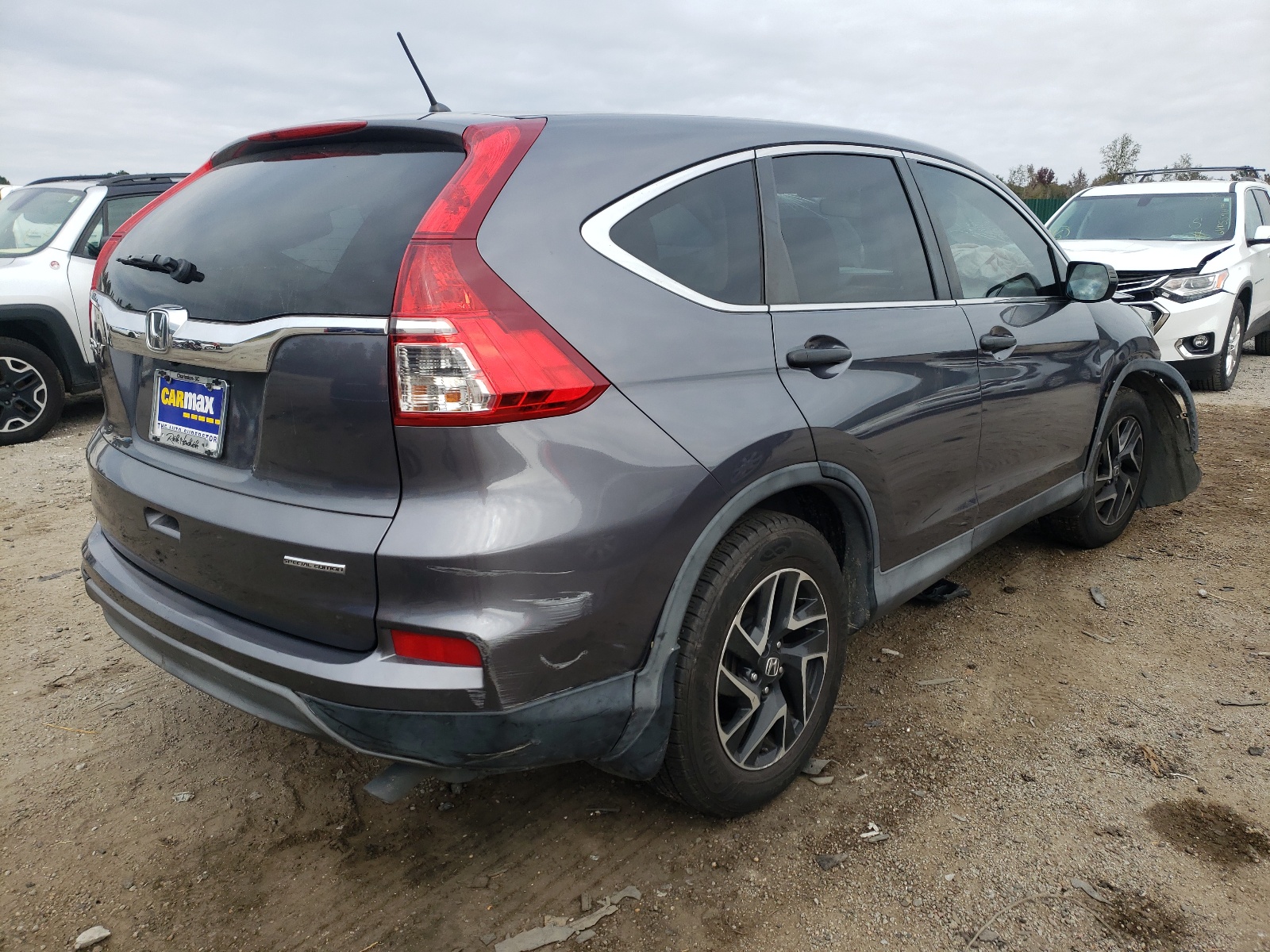 Photo 4 from auction – 2016 HONDA CR-V SE with VIN 2HKRM3H42GH542508