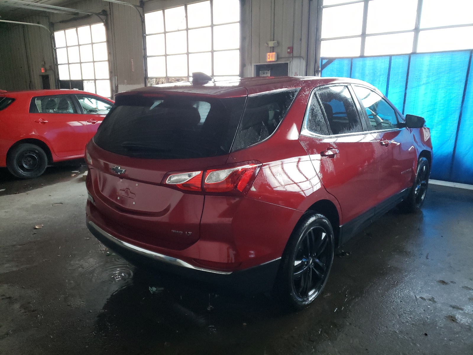 Photo 4 from auction – 2021 CHEVROLET EQUINOX LT with VIN 3GNAXUEV7ML345912