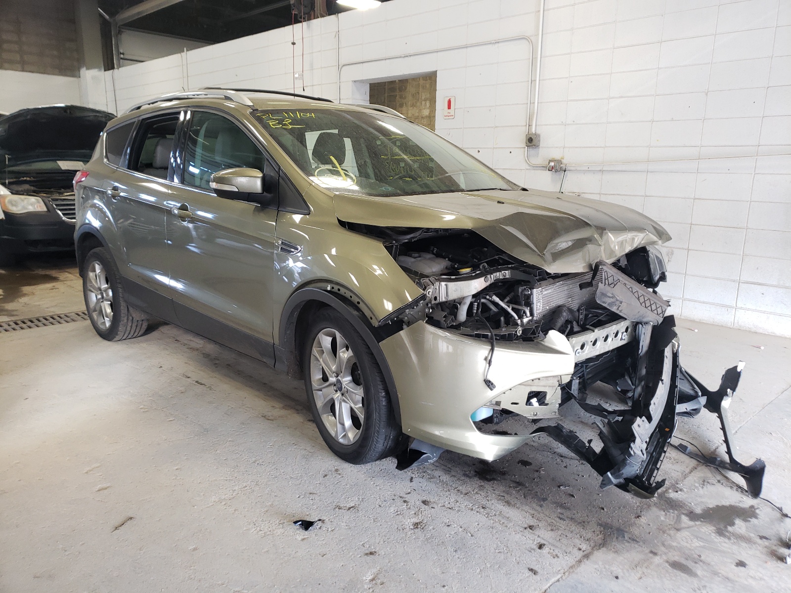 FORD ESCAPE TIT 2014 with VIN 1FMCU0JX6EUA38616 - Photo from auction
