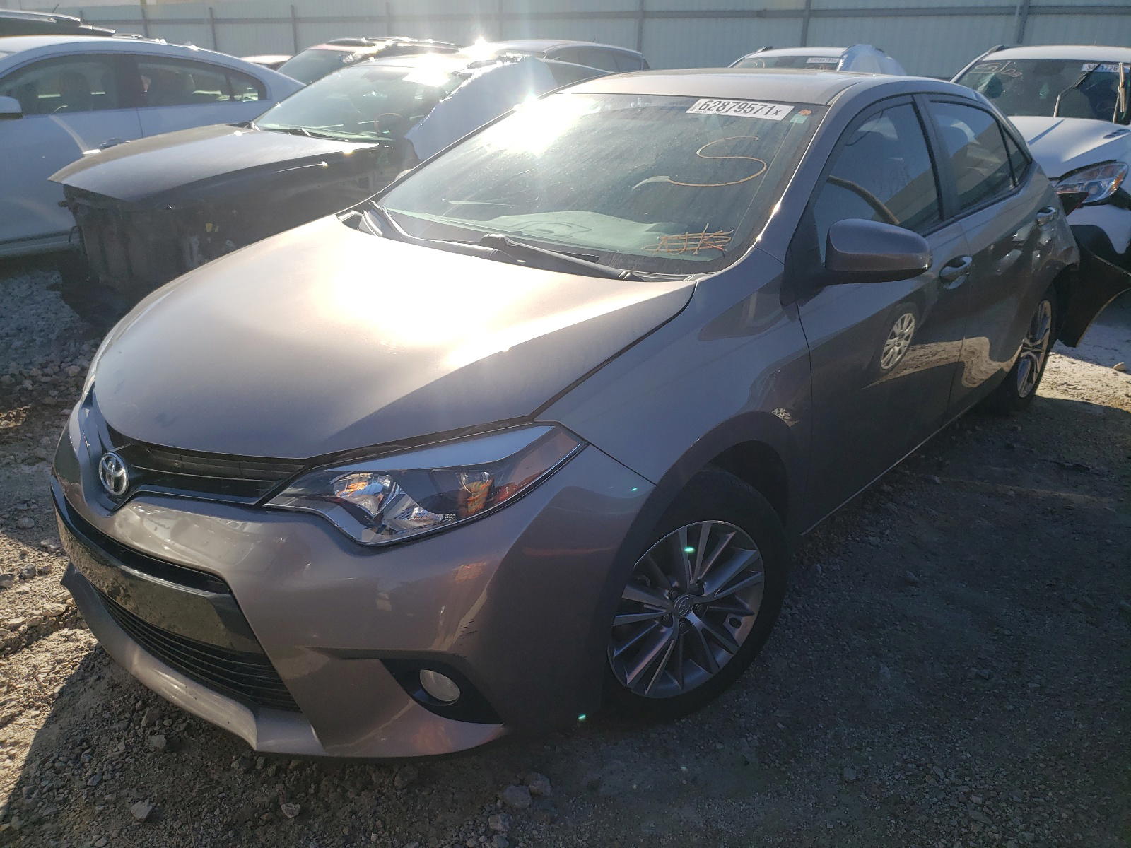 Photo 2 from auction – 2015 TOYOTA COROLLA L with VIN 5YFBURHE5FP317093