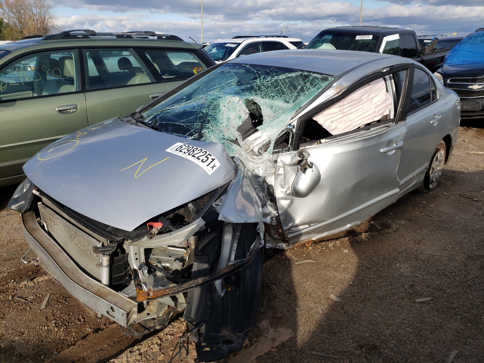Photo 2 from auction – 2010 HONDA CIVIC LX with VIN 19XFA1F52AE043859