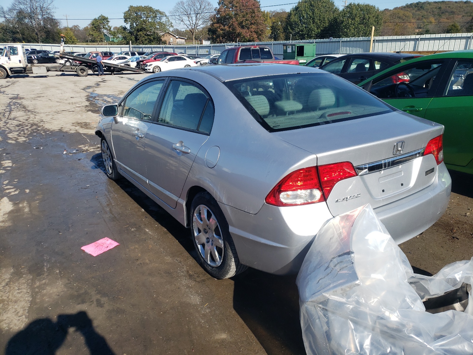Photo 3 from auction – 2011 HONDA CIVIC LX with VIN 19XFA1F50BE044090