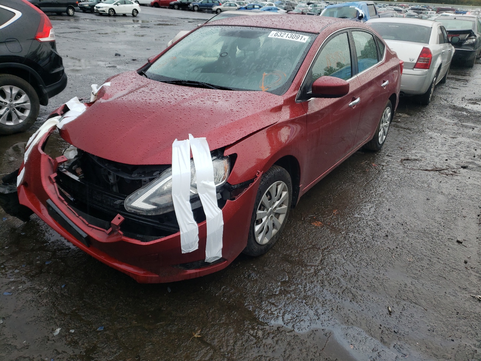 Photo 2 from auction – 2016 NISSAN SENTRA S with VIN 3N1AB7AP7GL653878