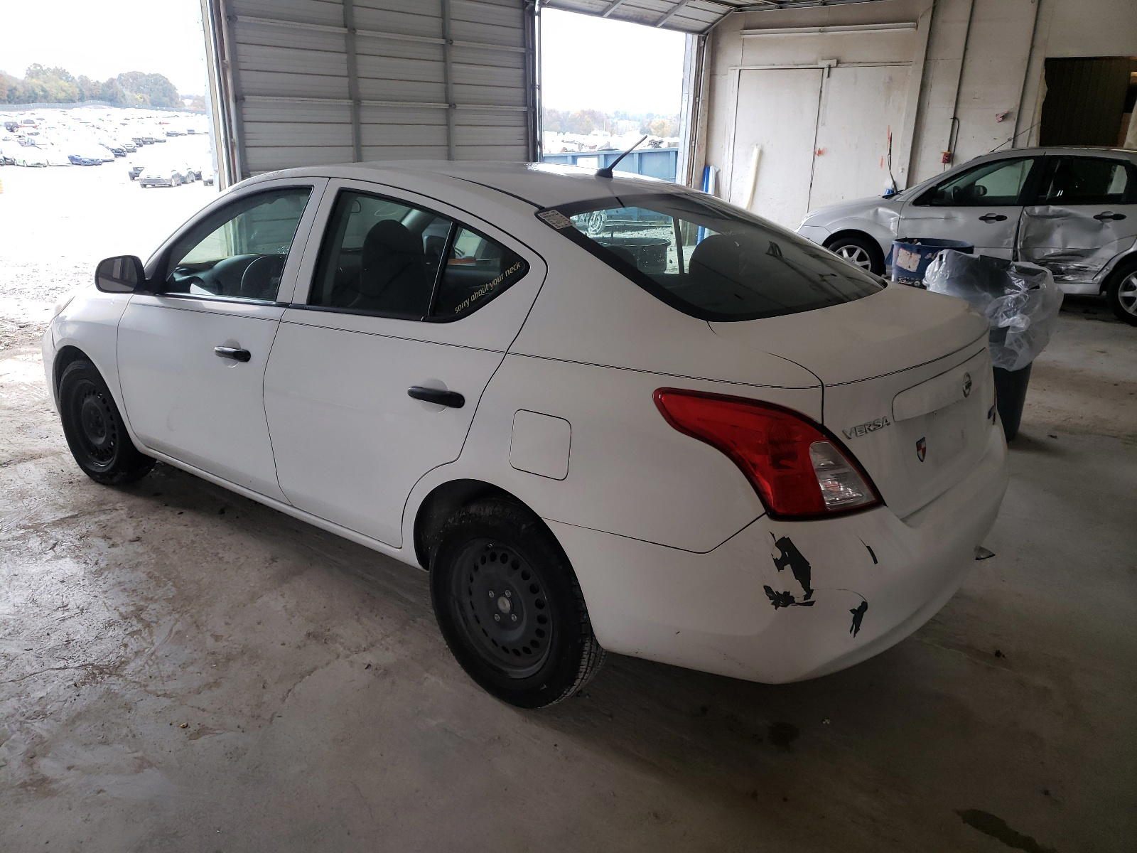 Photo 3 from auction – 2012 NISSAN VERSA S with VIN 3N1CN7AP5CL934023
