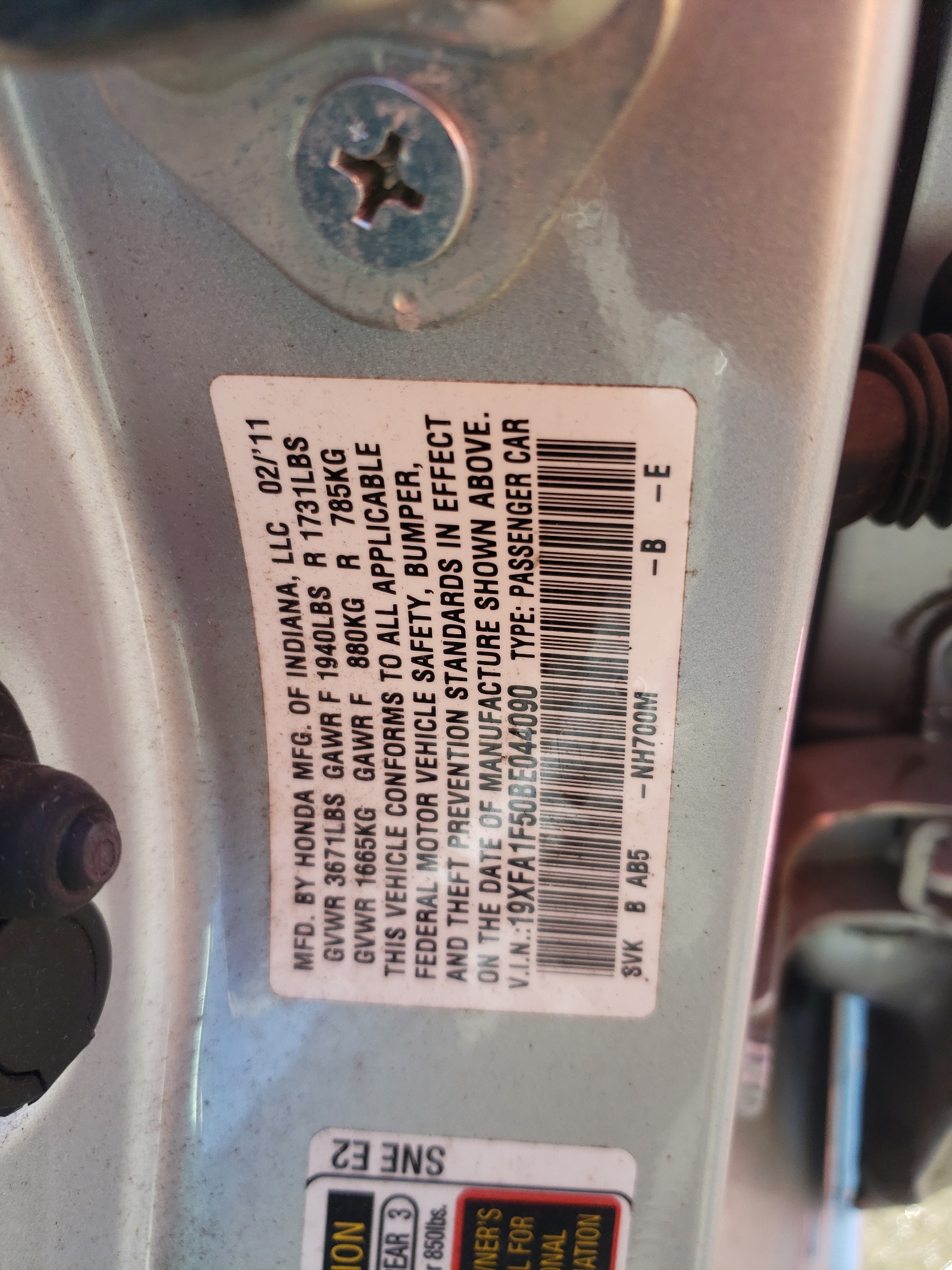 Photo 10 from auction – 2011 HONDA CIVIC LX with VIN 19XFA1F50BE044090