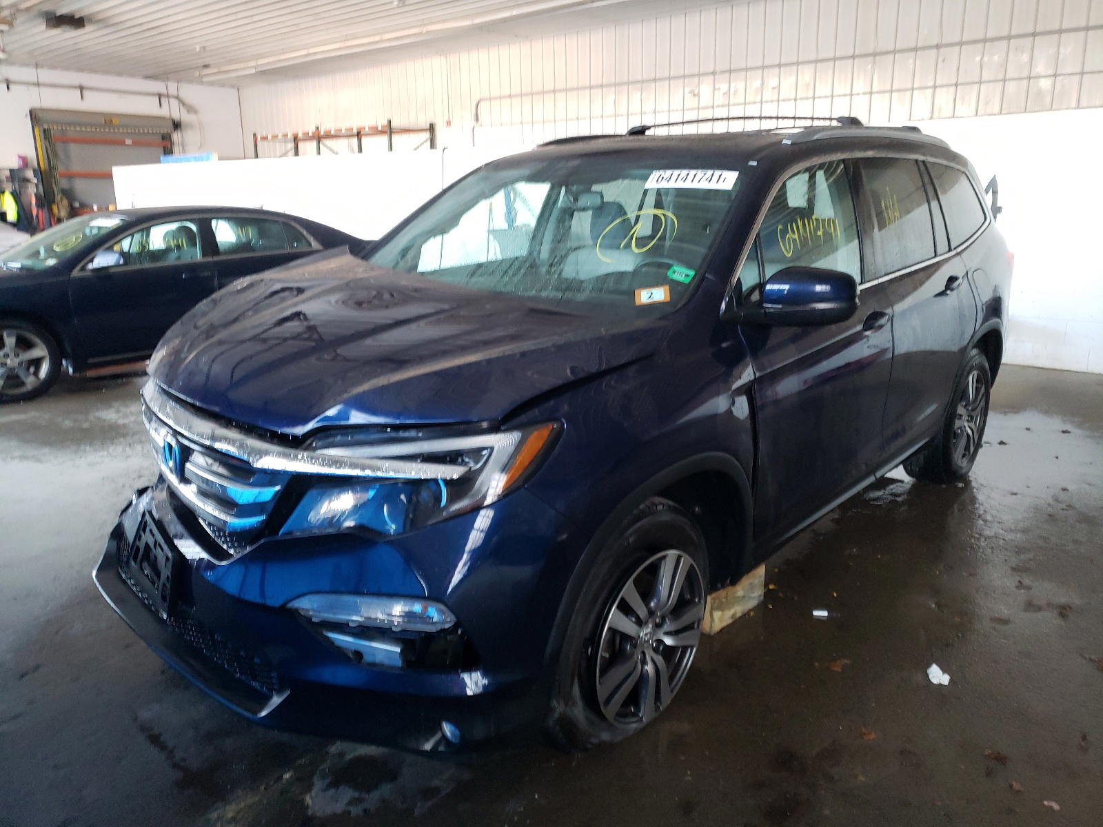 Photo 2 from auction – 2016 HONDA PILOT with VIN 5FNYF6H77GB102879