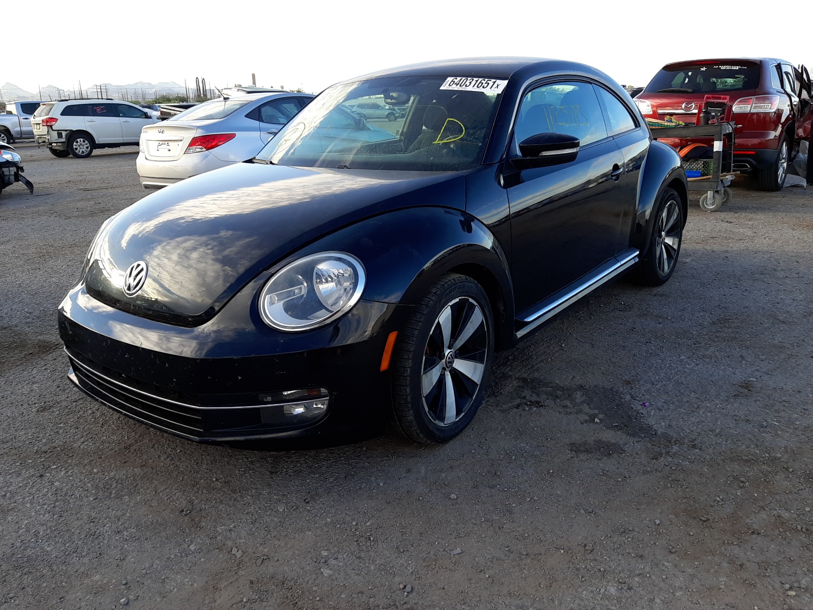 Photo 2 from auction – 2012 VOLKSWAGEN BEETLE TUR with VIN 3VWVA7AT1CM617037