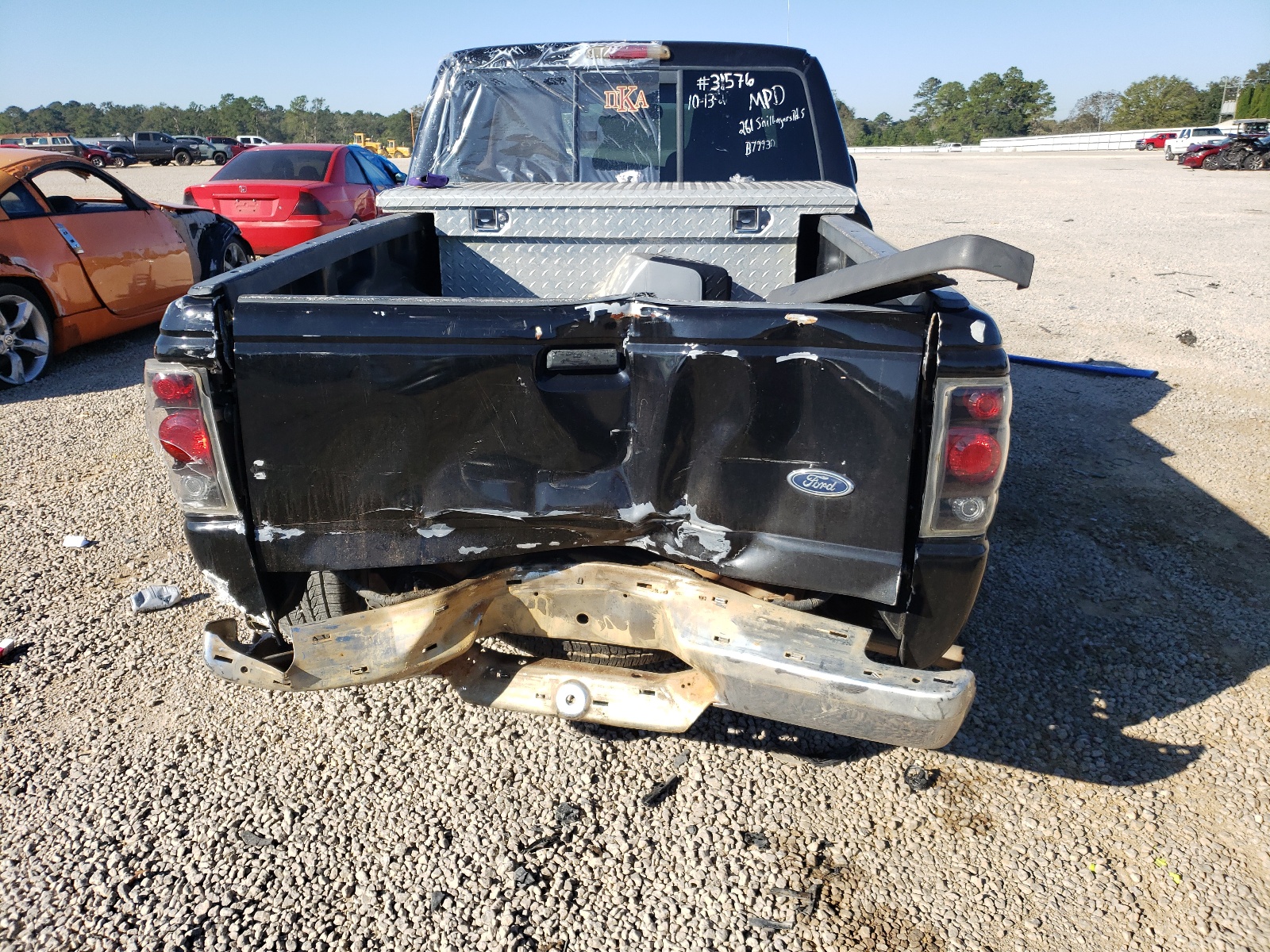 Photo 9 from auction – 1999 FORD RANGER with VIN 1FTYR10V0XPB79930