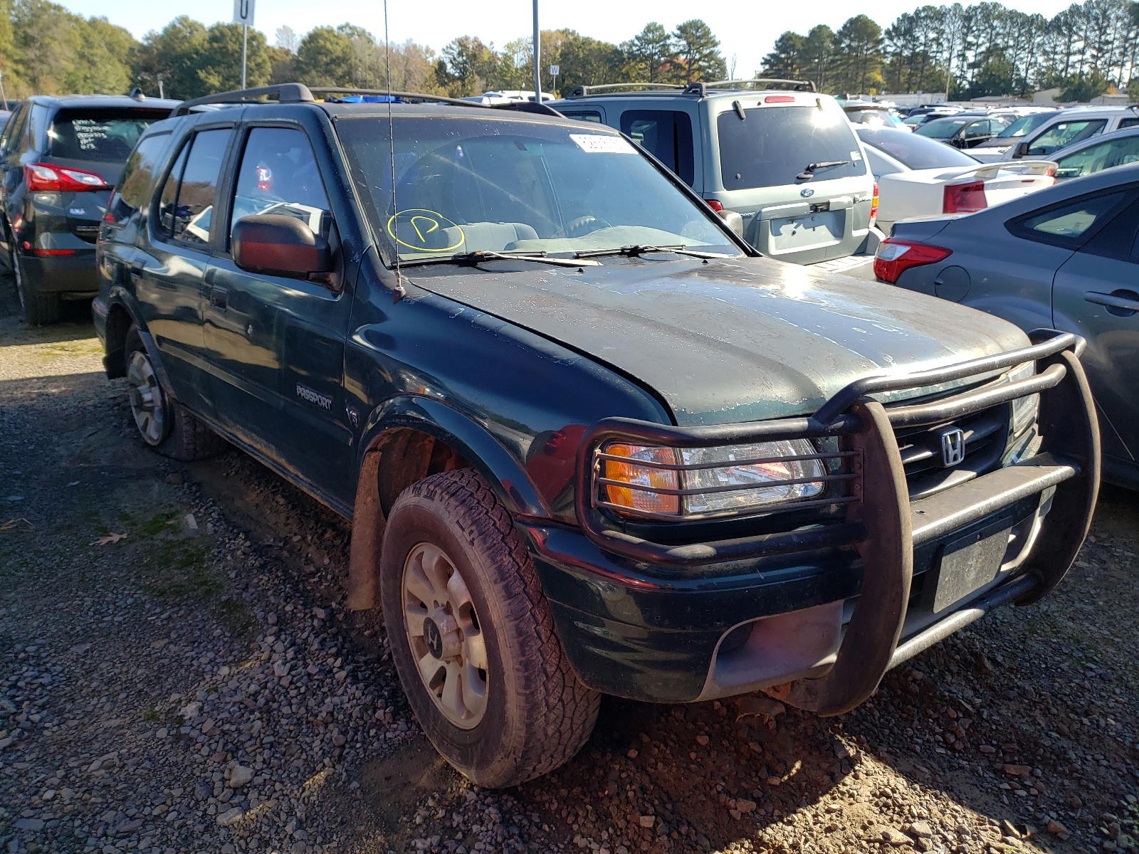 HONDA PASSPORT E 2001 with VIN 4S6DM58W214408752 - Photo from auction