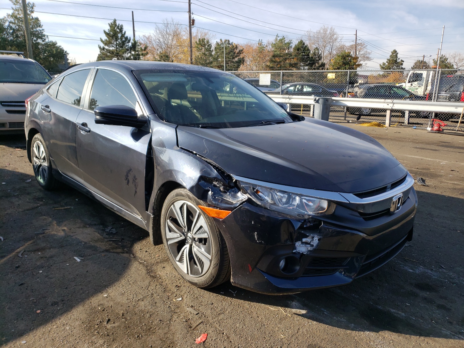 HONDA CIVIC EXL 2018 with VIN JHMFC1F74JX018388 - Photo from auction