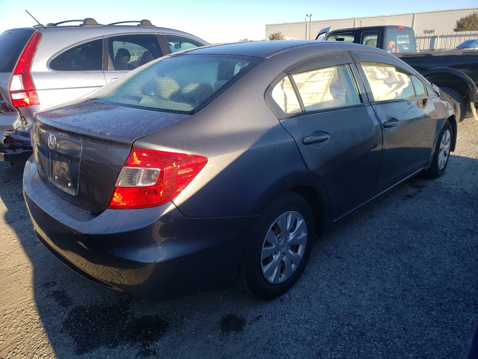 Photo 4 from auction – 2006 HONDA CIVIC LX with VIN 19XFB2F50CE007822