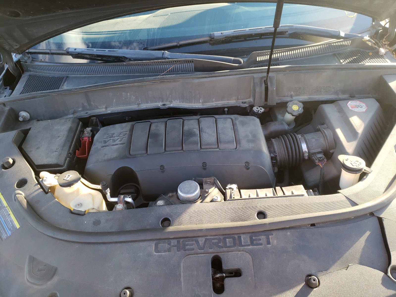 Photo 7 from auction – 2009 CHEVROLET TRAVERSE L with VIN 1GNEV33D79S105392