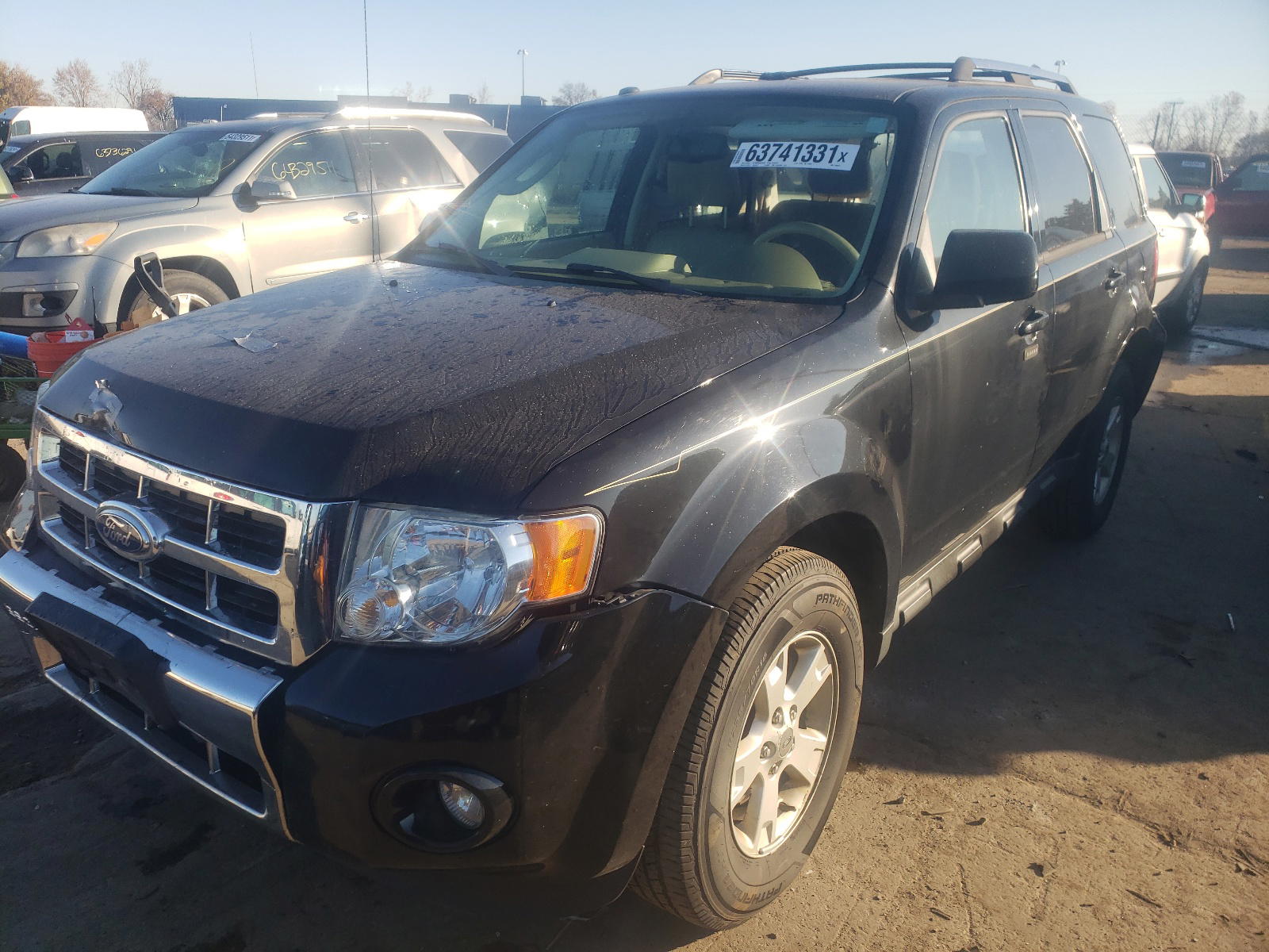 Photo 2 from auction – 2012 FORD ESCAPE LIM with VIN 1FMCU0E79CKB29057