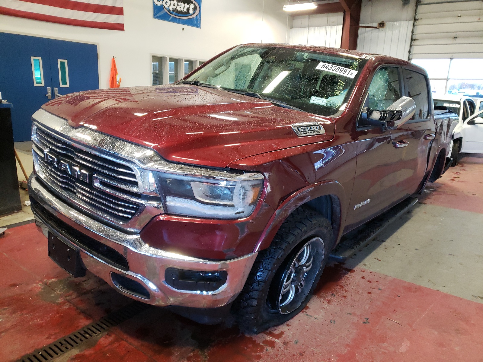 Photo 2 from auction – 2019 RAM 1500 LARAM with VIN 1C6SRFJT4KN507071