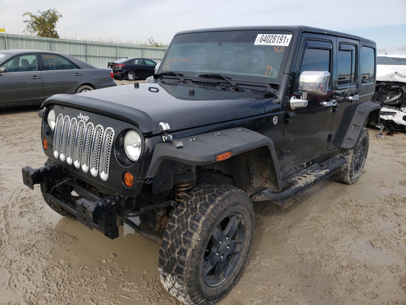 Photo 2 from auction – 2011 JEEP WRANGLER U with VIN 1J4BA3H18BL522021