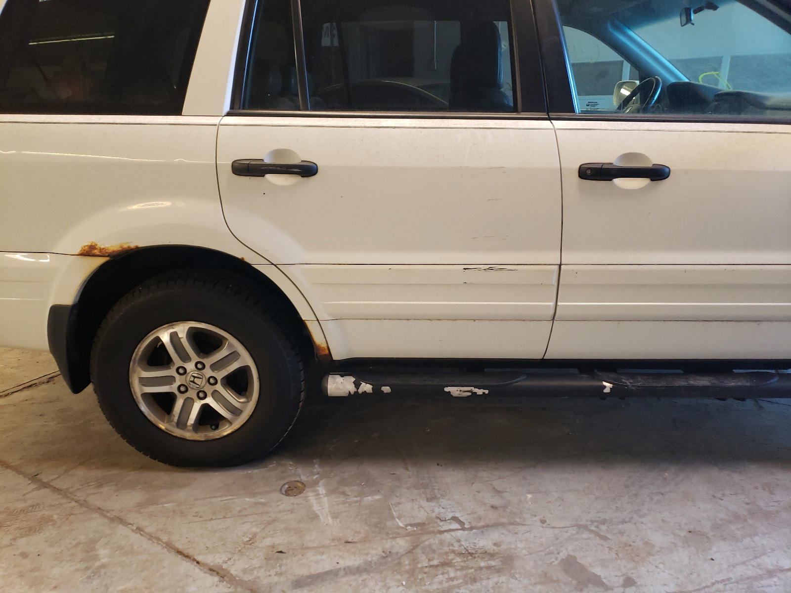 Photo 9 from auction – 2004 HONDA PILOT with VIN 5FNYF18574B001368
